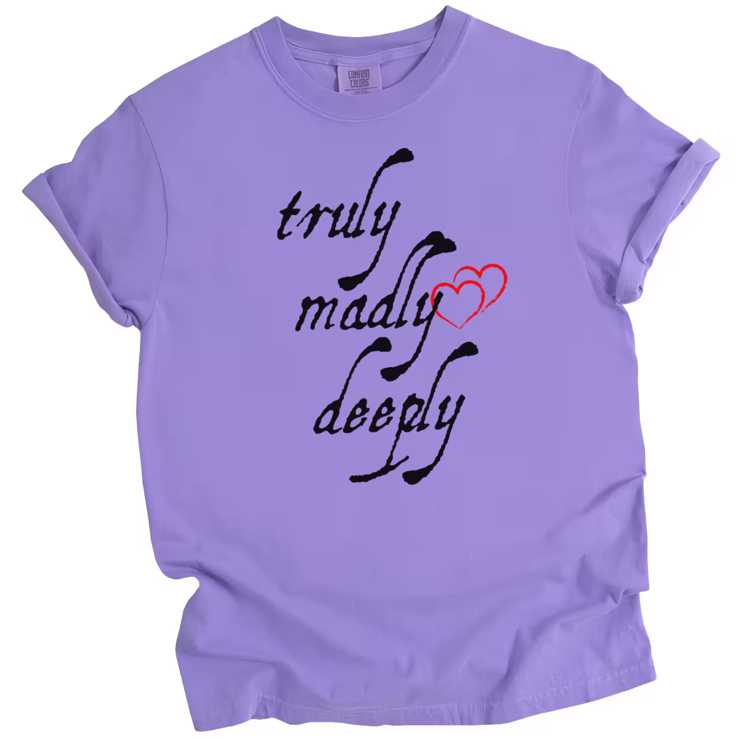 Purple Truly Madly Deeply t-shirt flat lay with bold vertical lettering and heart detail, fun love-themed women’s tee.