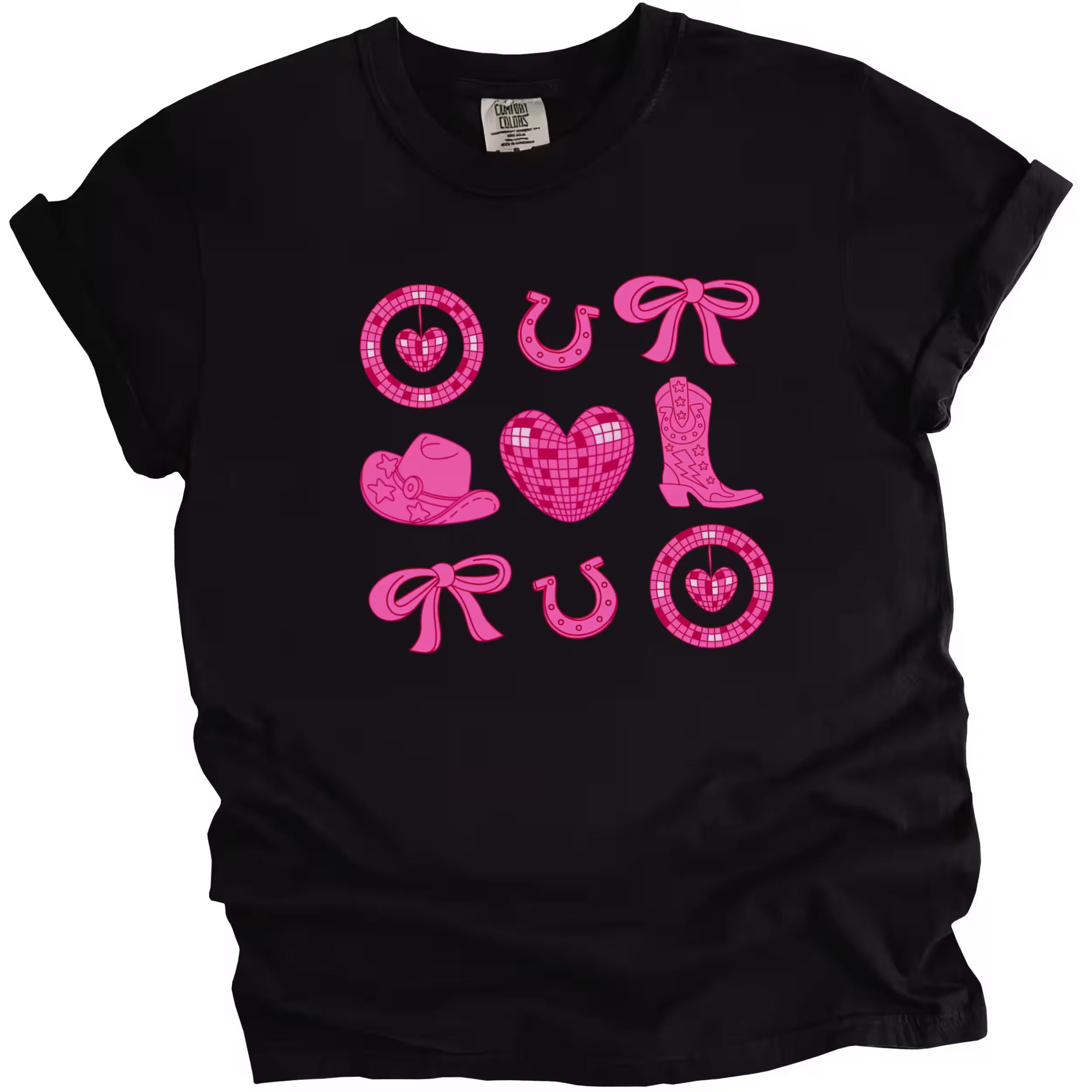 Black cowgirl coquette Valentine’s tee with hearts, boots, bows, and pink accents flat on white.