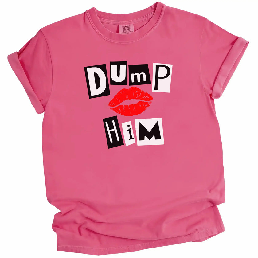 Berry pink “Dump Him” tee flat lay on white background featuring bold cutout letters and red lips design.