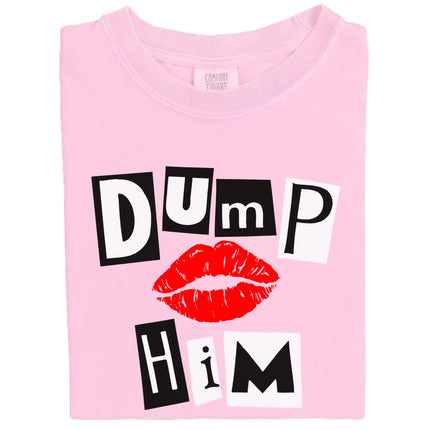 Folded light pink “Dump Him” Valentine’s tee with bold magazine-style letters and red lips on white background.