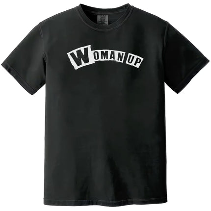 Black “Woman Up” t-shirt flat lay with bold lettering and confident feminist statement for women
