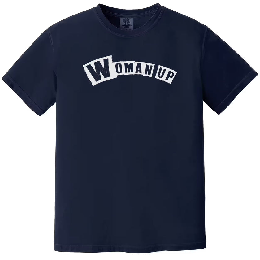 Navy “Woman Up” t-shirt flat lay highlighting bold graphic lettering and uplifting feminist vibe