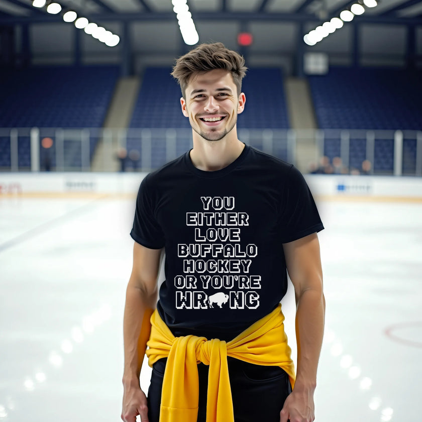 Man wearing a black Buffalo hockey t-shirt with the humorous ‘You Either Love Buffalo Hockey Or You’re Wrong’ design in pixel-style lettering and a creative buffalo silhouette detail.